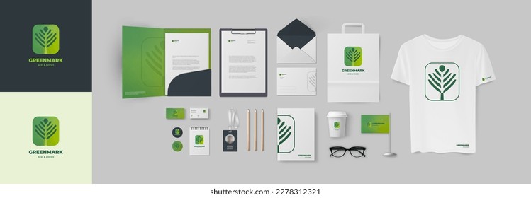 Starter pack for company design include green plant logo in minimalistic style and corporate identity set. Folder A4 and business card, envelope and ID badge, notepad and t-shirt, letterhead and cup