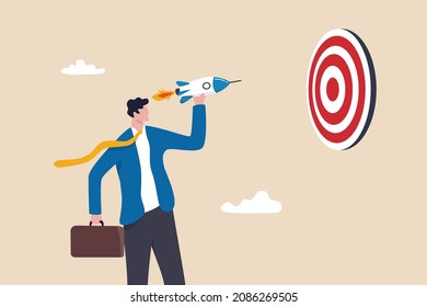 Startup success target, launch new product aim for win business achievement, marketing goal or target, project plan concept, confidence businessman launch new rocket to hit target dartboard bullseye.