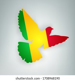 State flag of Mali (Republic of Mali) in the shape of a bird. Flying dove flaps its wings on a gray background. Symbol of love and peace concept. Vector illustration