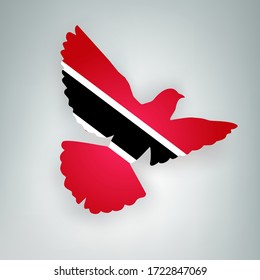 State flag of Republic of Trinidad and Tobago in the shape of a bird. Flying dove flaps its wings on a gray background. Symbol of love and peace vector concept. Holyday design banner