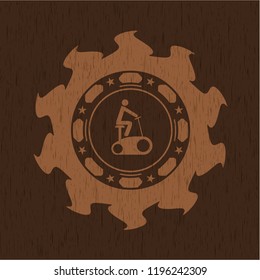 stationary bike icon inside badge with wooden background