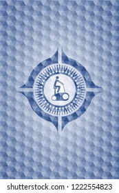 stationary bike icon inside blue hexagon badge.