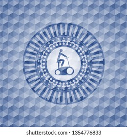stationary bike icon inside blue badge with geometric background.
