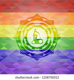 stationary bike icon inside emblem on mosaic background with the colors of the LGBT flag