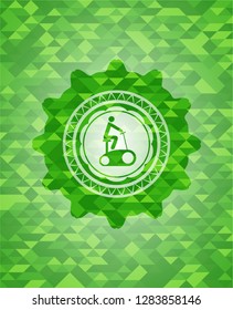 stationary bike icon inside green emblem with mosaic background