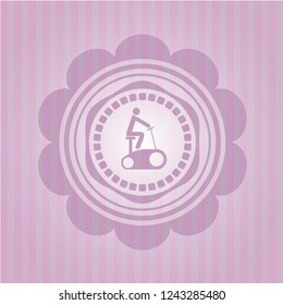 stationary bike icon inside pink emblem. Retro