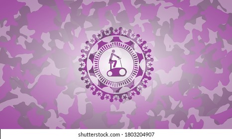 stationary bike icon inside pink camo emblem. 