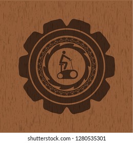 stationary bike icon inside realistic wooden emblem