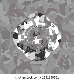 stationary bike icon on grey camouflaged pattern