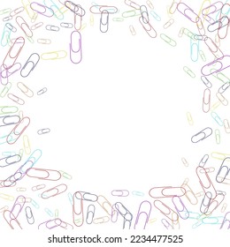 Stationery multi-colored bright paper clips are scattered over a white background. Background for design, school and office supplies