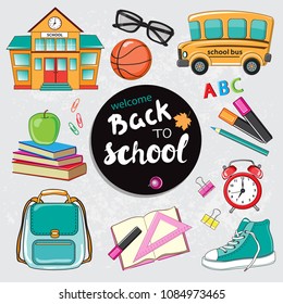 Stationery  school items, school bus and school building with lettering back to school