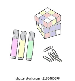 Stationery set of markers, paperclips, and Rubik´s cube