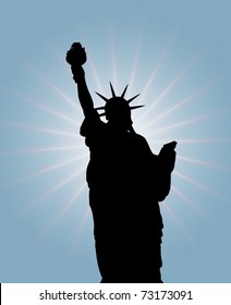 A statue of freedom is in the rays of a sun