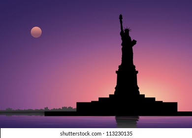 Statue of Liberty and New York City in the evening