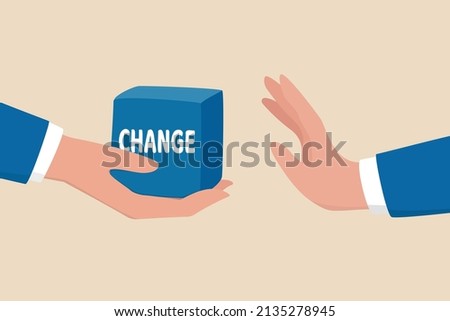 Status quo bias, fear or refuse to change, comfort zone or conservative thinking, afraid of changing risk or resist to make decision concept, businessman hand denied or refuse to get change cube box.