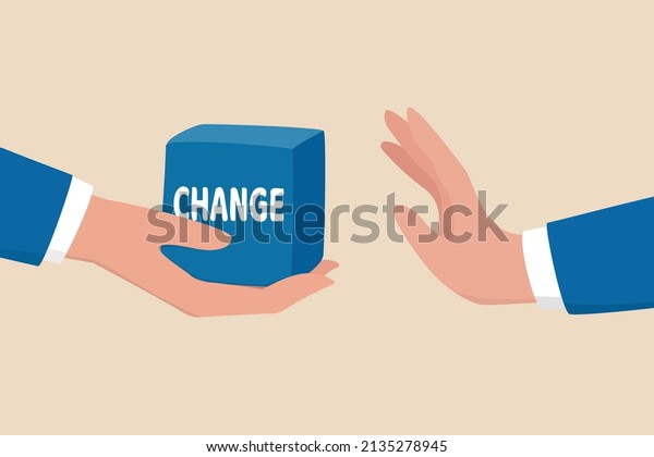 Status quo bias, fear or refuse to change, comfort\
zone or conservative thinking, afraid of changing risk or resist to\
make decision concept, businessman hand denied or refuse to get\
change cube box.