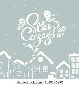 Stay Cozy calligraphic lettering hand written Christmas text. Cute greeting card design with hand drawn houses in scandinavian style. Modern winter season postcard, brochure