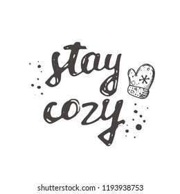 Stay cozy. Christmas logo, icon and label for your design. Lettering. Celebration motivational slogan. Hand drawn vector illustration. Can be used for sticker, badge, card, poster, banner.