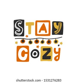 Stay cozy colored lettering. Hand drawn grunge style typography with garland. Christmas, New Year quote. Xmas poster, gift, postcard, greeting card design element