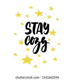 Stay cozy - hand drawn Autumn or Winter seasons holiday lettering phrase and stars doodles isolated on the white background. Fun brush ink vector illustration for banners, cards, posters design