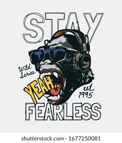 stay fearless slogan with gorilla in sunglasses wearing headphone illustration