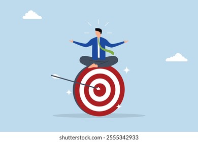 Stay focused and concentrate on business objective, calm entrepreneur contemplates while seated and concentrating on large archery bullseye. 