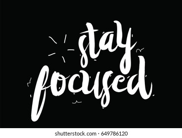 Stay focused. Greeting card with modern calligraphy and hand drawn elements. Isolated typographical concept. Inspirational motivational quote. Vector design.