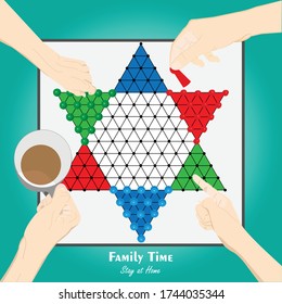 Stay at home. Board of game Halma  Family spending time together at home to playing Halma. Close up view of Hands are playing Halma together and some are enjoying a cup of coffee.