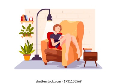 Stay at home concept. The girl is reading novel on the couch