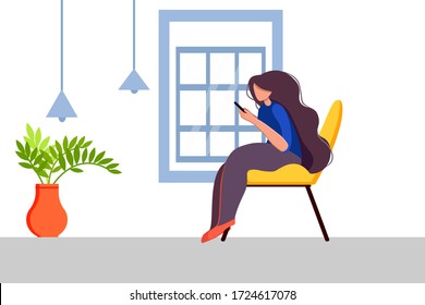 Stay home concept. Young woman on a couch with a smartphone chatting on social networks and receiving messages or mail. surfing the internet. Augmented reality, everyday use of devices and gadgets.