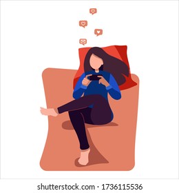 Stay home concept. Young woman on the bed with a smartphone chatting on social networks. Rest, free time. Surfing the internet. Everyday use of devices and gadgets. Unemployment