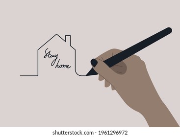 Stay home conceptual illustration, a hand drawing a silhouette of a house, global pandemic and lockdown