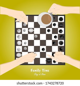 Stay at home. Family spending time together at home to playing chess. Close up view of Hands are playing chess and there are enjoying a cup of coffee.