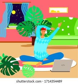 Stay at home. The guy listens to music. Headphones are white. Green sofa. Sitting on the floor. Interior of the room.