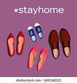 Stay home motivational banner. Shoes on the carpet before leaving the house. The concept of taking off shoes as a call is at home. Top view