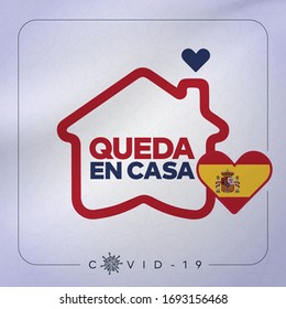 Stay home, stay safe. Covid 19 coronavirus quarantine. Protection campaign or measure from coronavirus. New Coronavirus, slogan with house and heart inside. Translation: Queda en casa, spanish flag.