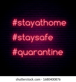 Stay at home, Stay safe, Quarantine quote for protection from coronavirus. Hashtag Quarantine neon sign. Coronavirus night neon signboard. Vector design for social media and network.