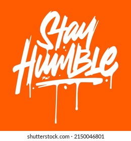 Stay humble. Hand drawn lettering on orange background.