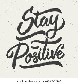 Stay positive. Hand drawn lettering phrase isolated on white background. Design element for poster, greeting card. Vector illustration