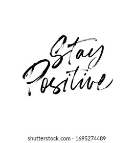 Stay positive hand drawn vector brush calligraphy. Positive, happy and optimistic lettering quote or phrase. Ink illustration isolated on white background. Wise saying handwritten vector calligraphy. 