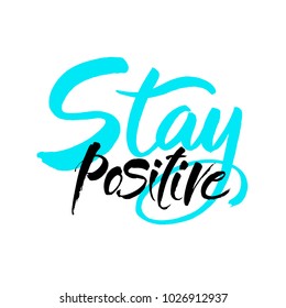 Stay positive inscription. Greeting card with calligraphy. Hand drawn brush lettering design. Photo overlay. Typography for banner, poster or apparel design. Isolated vector element.