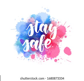 Stay safe - handwritten lettering on watercolor splash. Motivational and inspirational calligraphy text.