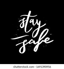 Stay safe. Stay home. Isolated vector phrases on black background.