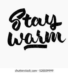 Stay warm quote. Ink hand lettering. Modern brush calligraphy. Handwritten phrase. Inspiration graphic design typography element. Rough simple vector sign.