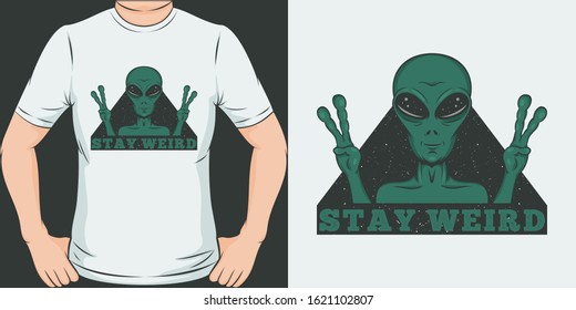 Stay Weird. Unique and Trendy Alien T-Shirt Design or Mockup.