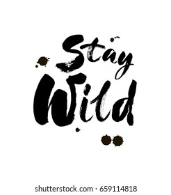 Stay wild hand written lettering for greeting card, tee print, banner, poster. Stay wild quote. Motivational quote. Typography poster. Brush texture. Vector illustration.