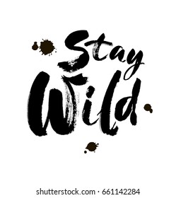 Stay wild hand written lettering for greeting card, tee print, banner, poster. Stay wild quote. Motivational quote. Typography poster. Brush texture. Vector illustration.
