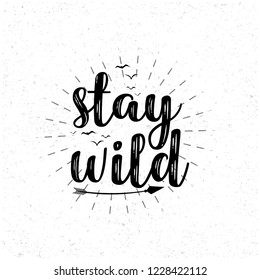 Stay Wild. Hand written typographic vector illustration. calligraphic inspirational quote for posters, t-shirts, cards, prints, wall decals and stickers. 