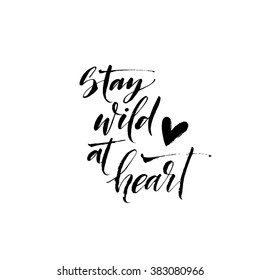 Stay wild at heart card. Hand drawn lettering background. Ink illustration. Modern brush calligraphy. Isolated on white background. 