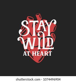 Stay wild at heart typography quote. Hand drawn motivational lettering design for t-shirt apparel prints posters. Vector vintage illustration.